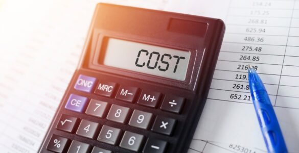 Startup costs in Nigeria in 2026 showing business budget, calculator, naira notes, and startup expense planning