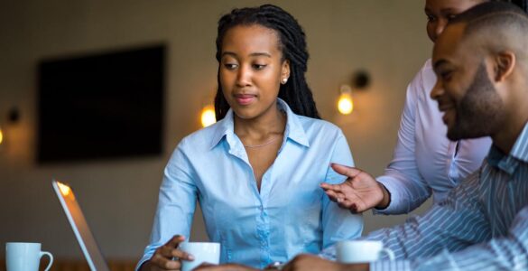 Entrepreneur reviewing Nigeria business environment opportunities and challenges in a modern office